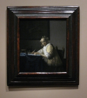 Johannes Vermeer's A Lady Writing with frame