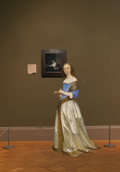 Johannes Vermeer's A Lady Writing in scale