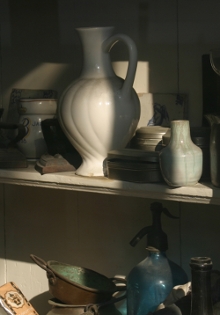The play of light on a Delft antique shop window