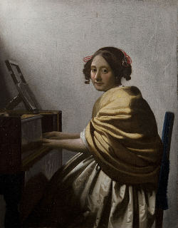 A Young Woman Seated at the Virginal, attributed to Johannes Vermeer